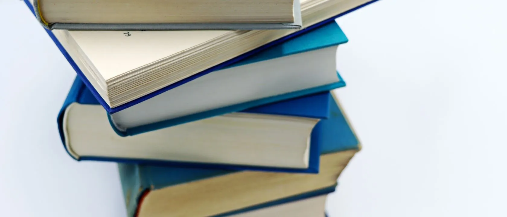Stack of blue hardcover books