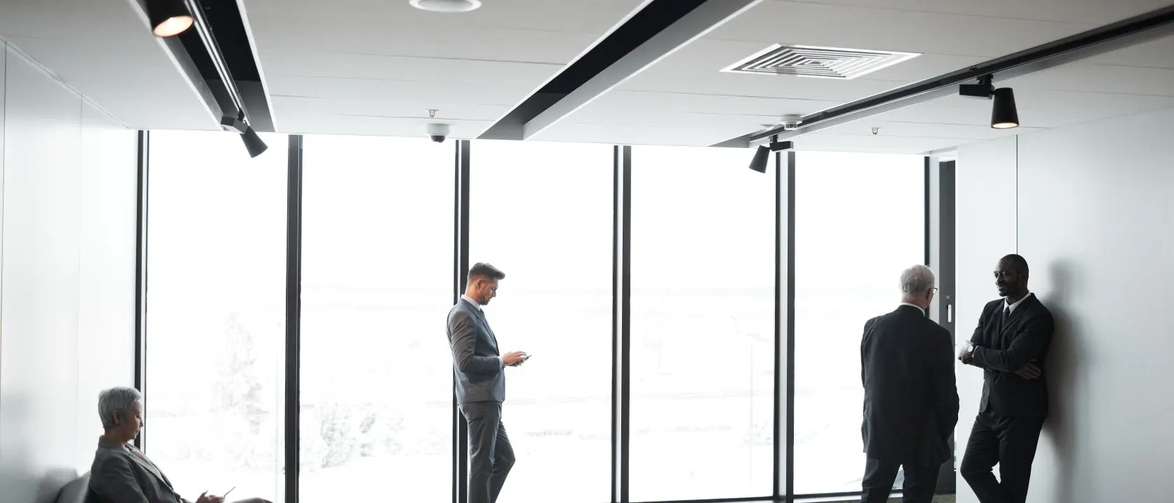 Modern business meeting in a bright, light-flooded office